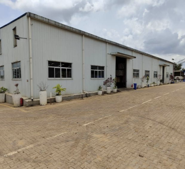 Construction des Entrepôts de l’Usine PREMIDIS et Aménagement 38.000 M² en Pavés Autobloquant sur Lubumbashi